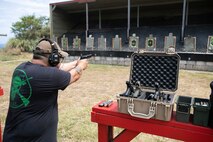 A shooter fires his pistol during a recreational fire, Kaneohe Bay Range Training Facility, Marine Corps Base Hawaii (MCBH), Aug. 2, 2019. The Kaneohe Bay Range Training Facility opened one of its ranges to service members, law enforcement, Department of Defense affiliates, retirees and their guests to fire their personal firearms on the first Friday of the month. The MCBH Recreational Fire program promotes marksmanship and safe use of firearms. (U.S. Marine Corps photo by Sgt. Jesus Sepulveda Torres)