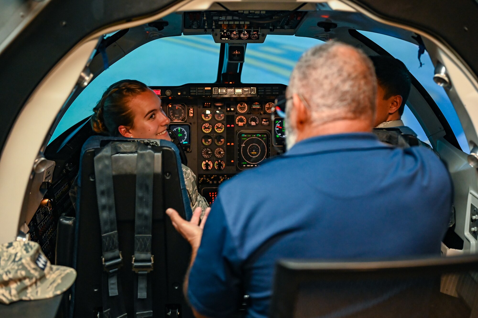 A Civil Air Patrol cadet speaks to a T-1 Jayhawk simulation instructor at Laughlin Air Force Base, Texas, June 28, 2023.