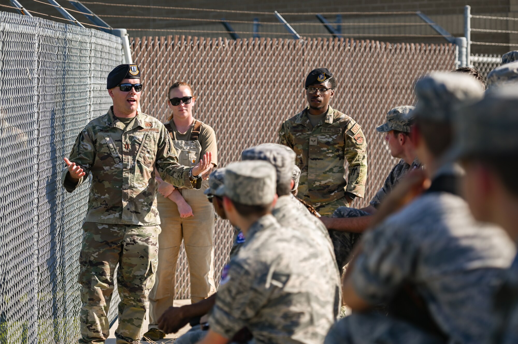 U.S. Air Force Capt. Robert Stone (left), 47th Security Forces Squadron commander, speaks to a group of Civil Air Patrol cadets at Laughlin Air Force Base, Texas, June 28, 2023.