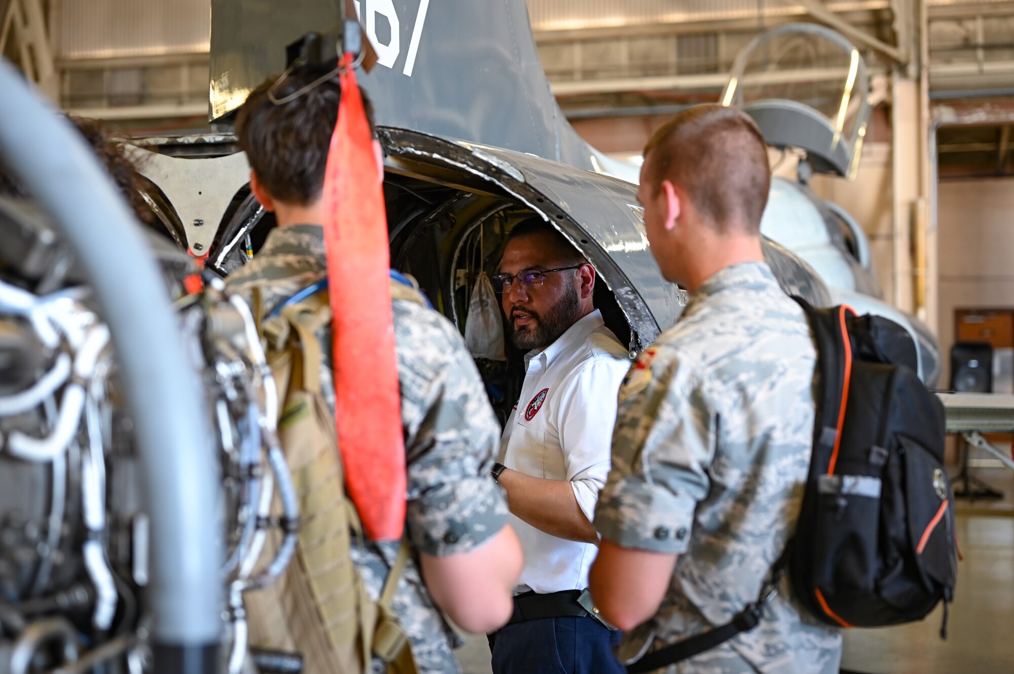 Civil Air Patrol cadets speak to a 47th Maintenance Directorate T-38 Talon maintainer at Laughlin Air Force Base, Texas, June 28, 2023.