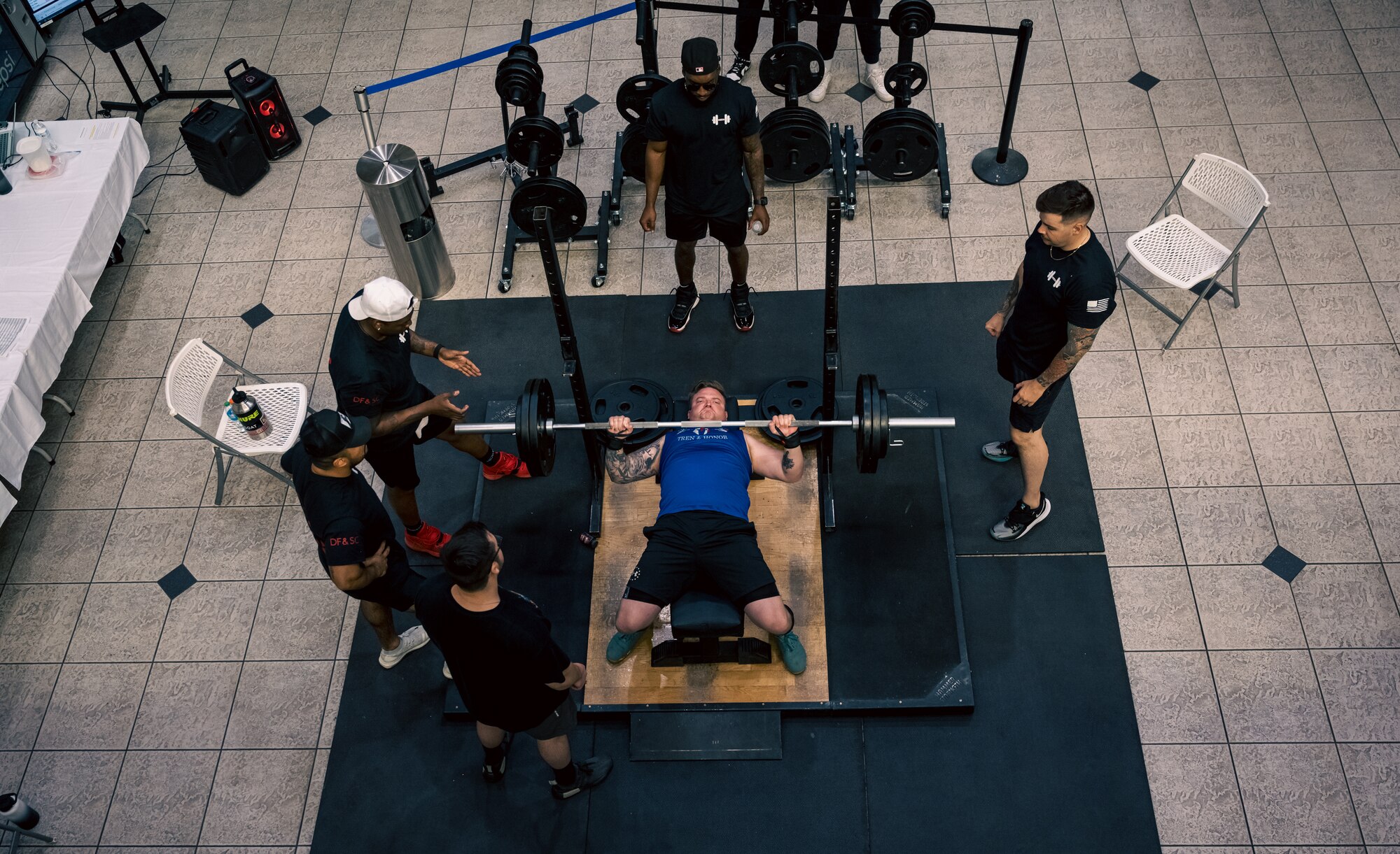 U.S. Air Force Master Sgt. Stuart Smith, 9th Attack Squadron operations superintendent, performs a bench press during a weightlifting meet at Holloman Air Force Base, New Mexico, July 8, 2023. The competition was comprised of three main events: the back squat, bench press, and deadlift. (U.S. Air Force by Senior Airman Antonio Salfran)