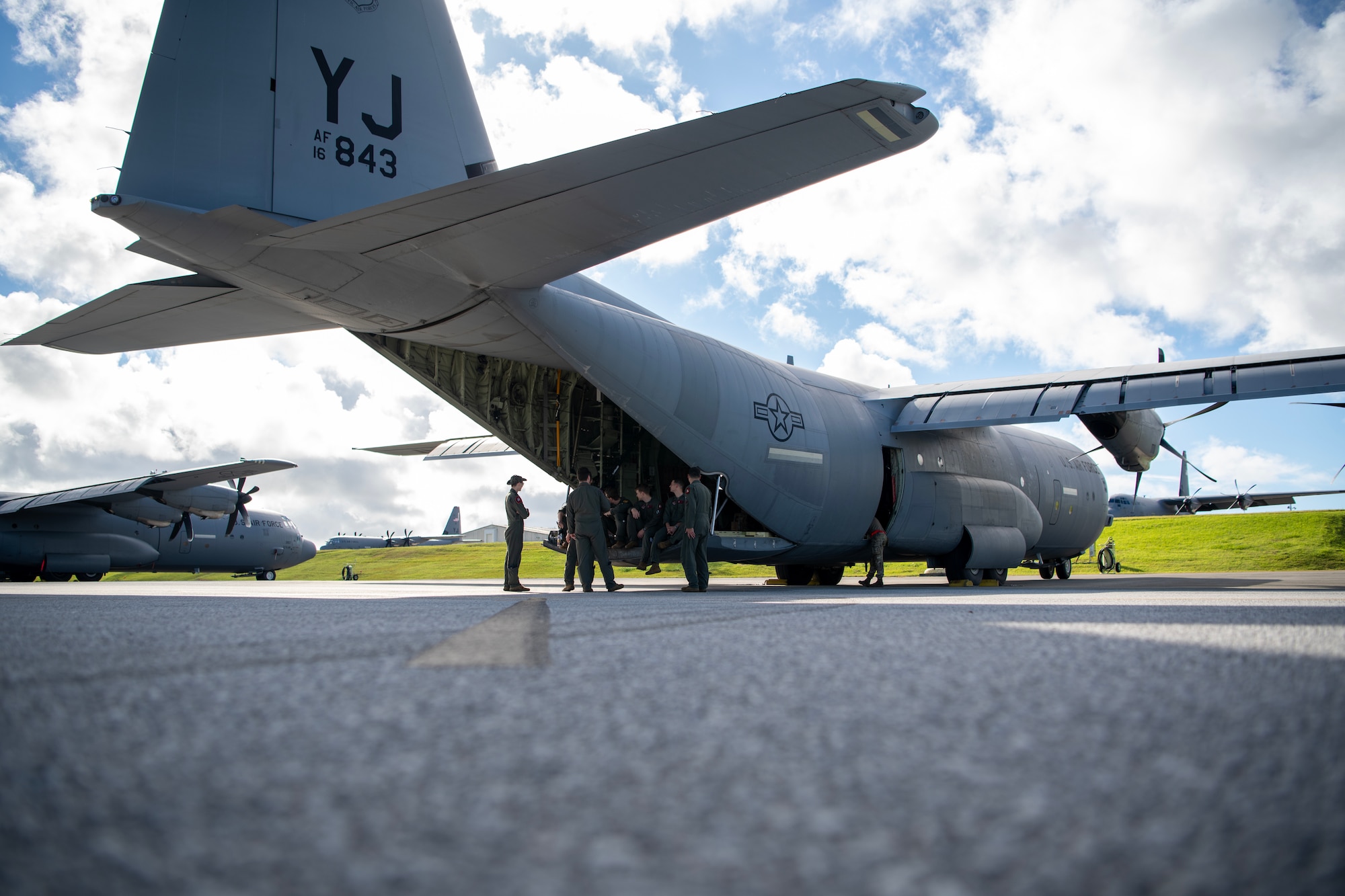 Airmen prepared for takeoff aboard a C-130J