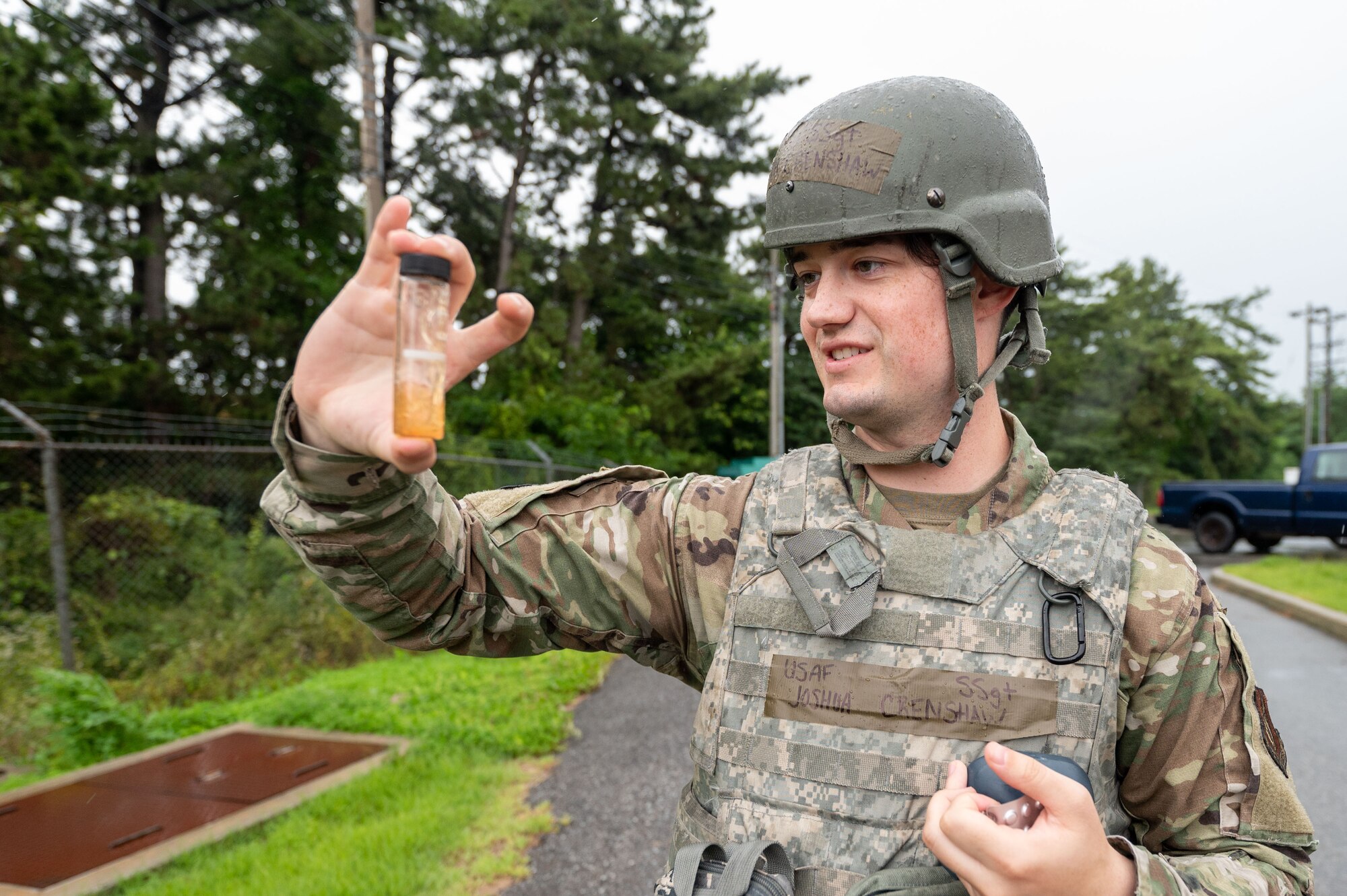 8th Operational Medical Readiness Squadron bioenvironmental non-commissioned officer in charge, mixes a solution to ensure the water produced by the reserve osmosis water purification unit is safe for consumption during training