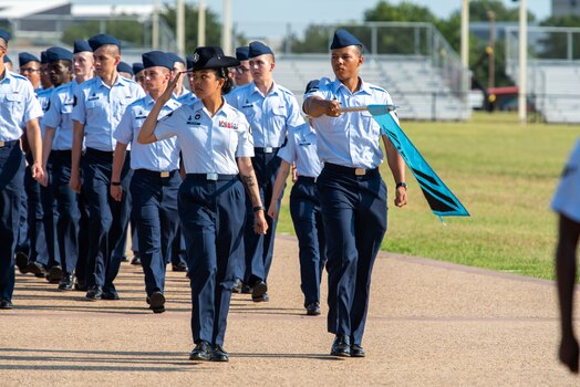  U.S. Space Force Guardians graduating from Basic Military Training (BMT) march in formation during a graduation ceremony at Joint Base San Antonio–Lackland, Texas, on June 22, 2023.