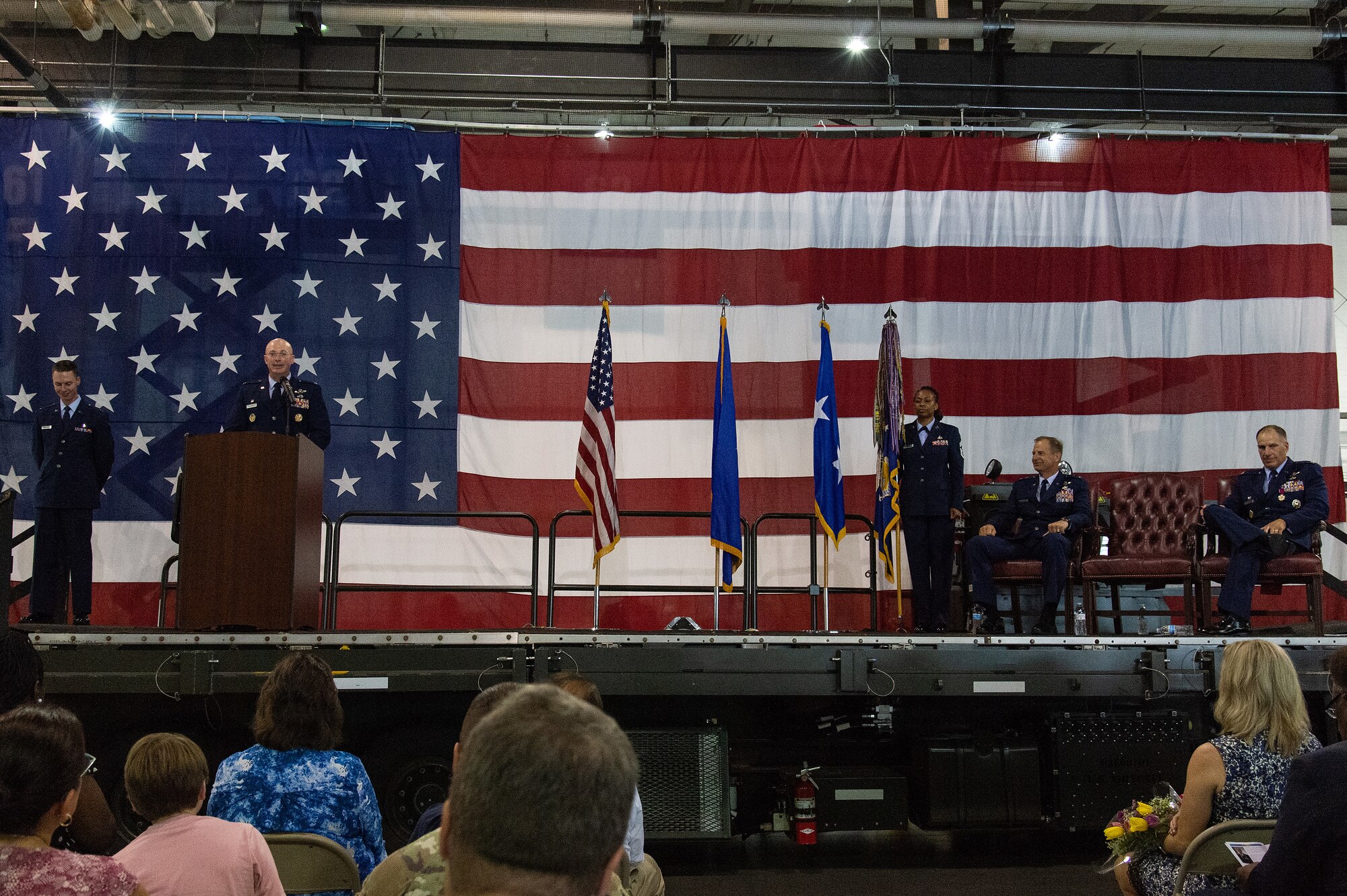 Col. William C. McDonald, 436th Airlift Wing commander, speaks to Team Dover members, friends, family, guests, civic leaders and congressional delegates during the 436th AW Change of Command ceremony at Dover Air Force Base, Delaware, July 7, 2023. Upon taking command, McDonald became the wing’s 37th commander. (U.S. Air Force photo by Roland Balik)