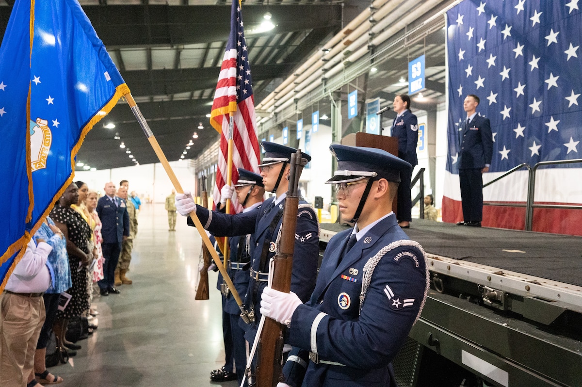 Tech. Sgt. Alicia Garcia, Staff Sgt. Julio Alonso Airman Leadership School instructor, sings the national anthem during the 436th Airlift Wing Change of Command ceremony at Dover Air Force Base, Delaware, July 7, 2023. Col. Matthew S. Husemann relinquished command to Col. William C. McDonald in a ceremony attended by family, friends, distinguished visitors, local civic leaders and members of Team Dover. (U.S. Air Force photo by Mauricio Campino)