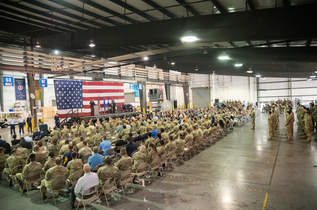 Maj. Gen. Corey J. Martin, 18th Air Force commander, gives opening remarks during the 436th Airlift Wing Change of Command ceremony at Dover Air Force Base, Delaware, July 7, 2023. Col. Matthew S. Husemann relinquished command to Col. William C. McDonald in a ceremony attended by family, friends, distinguished visitors, local civic leaders and members of Team Dover. (U.S. Air Force photo by Mauricio Campino)