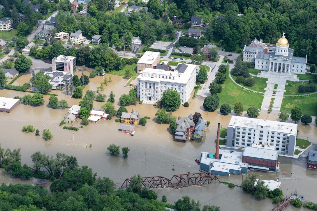 An aerial view of flooding in a small city.