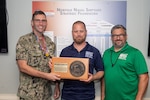 Norfolk Naval Shipyard's Mr. James Hardin from the Production Resource Office (Code 900), Outside Machine Shop (Shop 38), received the honor to have the Production Resource Office conference room named after him for the month of June 2023 for his leadership skills.