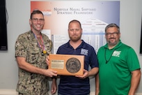 Norfolk Naval Shipyard's Code 900 Production Resource Officer, Capt. Frank Gasperetti, congratulated Code 926 Workforce Development Lead Mr. James Anderson for receiving the honor to have the Production Resource Office conference room named after him for the month of June 2023. Anderson was chosen because of his passion for building an effective workforce development program and his commitment to building and improving the program for Code 926 and all the trades in Code 900.