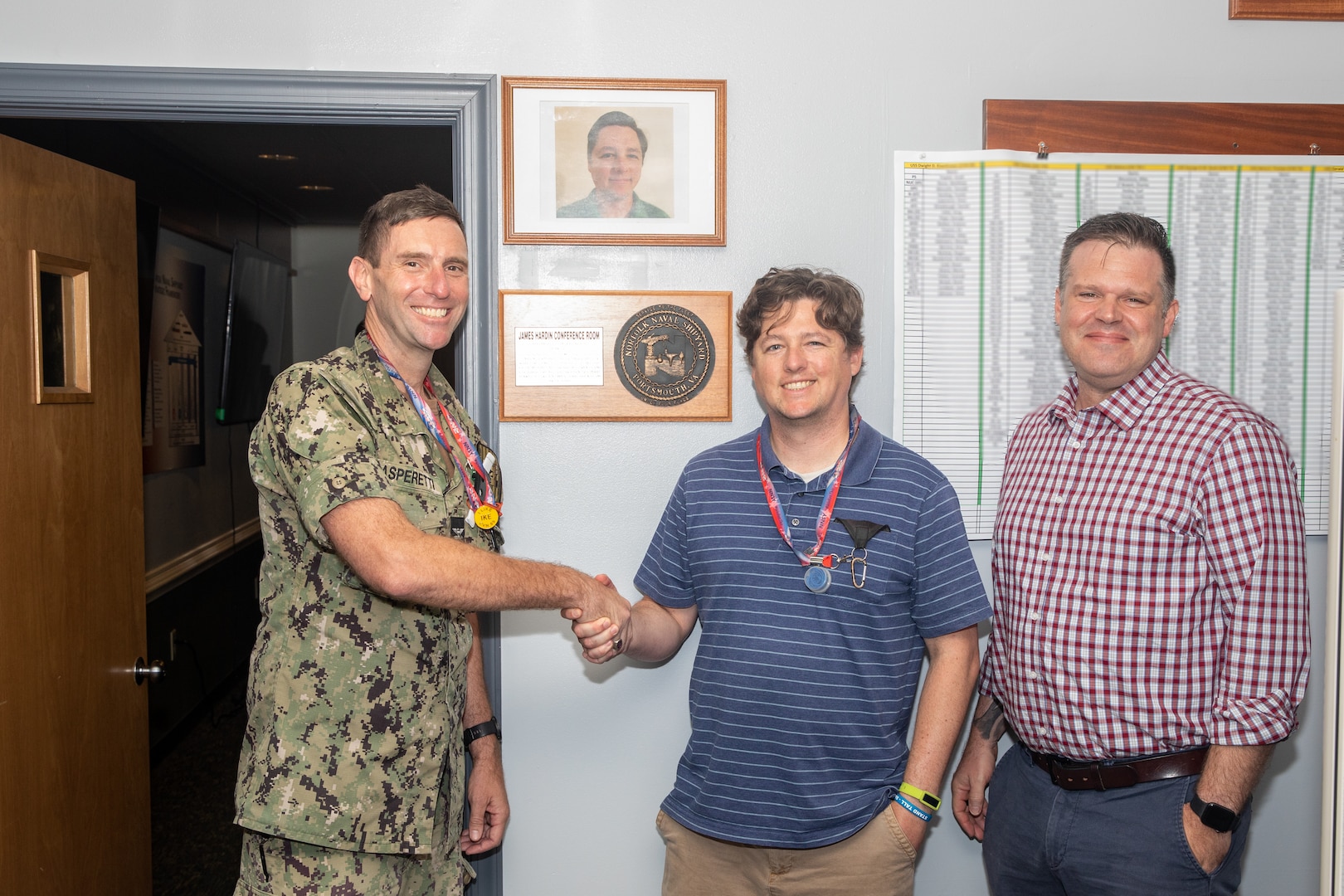 Norfolk Naval Shipyard's Code 900 Production Resource Officer, Capt. Frank Gasperetti, congratulated Mr. James Hardin from the Production Resource Office (Code 900), Outside Machine Shop (Shop 38), for receiving the honor to have the Production Resource Office conference room named after him for the month of June 2023 for his leadership skills.