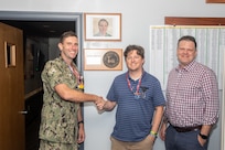 Norfolk Naval Shipyard's Code 900 Production Resource Officer, Capt. Frank Gasperetti, congratulated Mr. James Hardin from the Production Resource Office (Code 900), Outside Machine Shop (Shop 38), for receiving the honor to have the Production Resource Office conference room named after him for the month of June 2023 for his leadership skills.