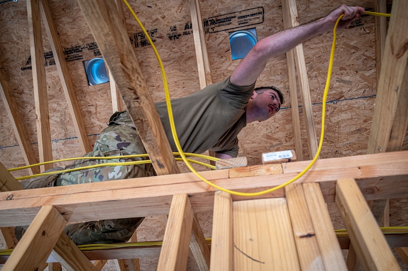 103rd Engineers help build houses for disabled native veterans