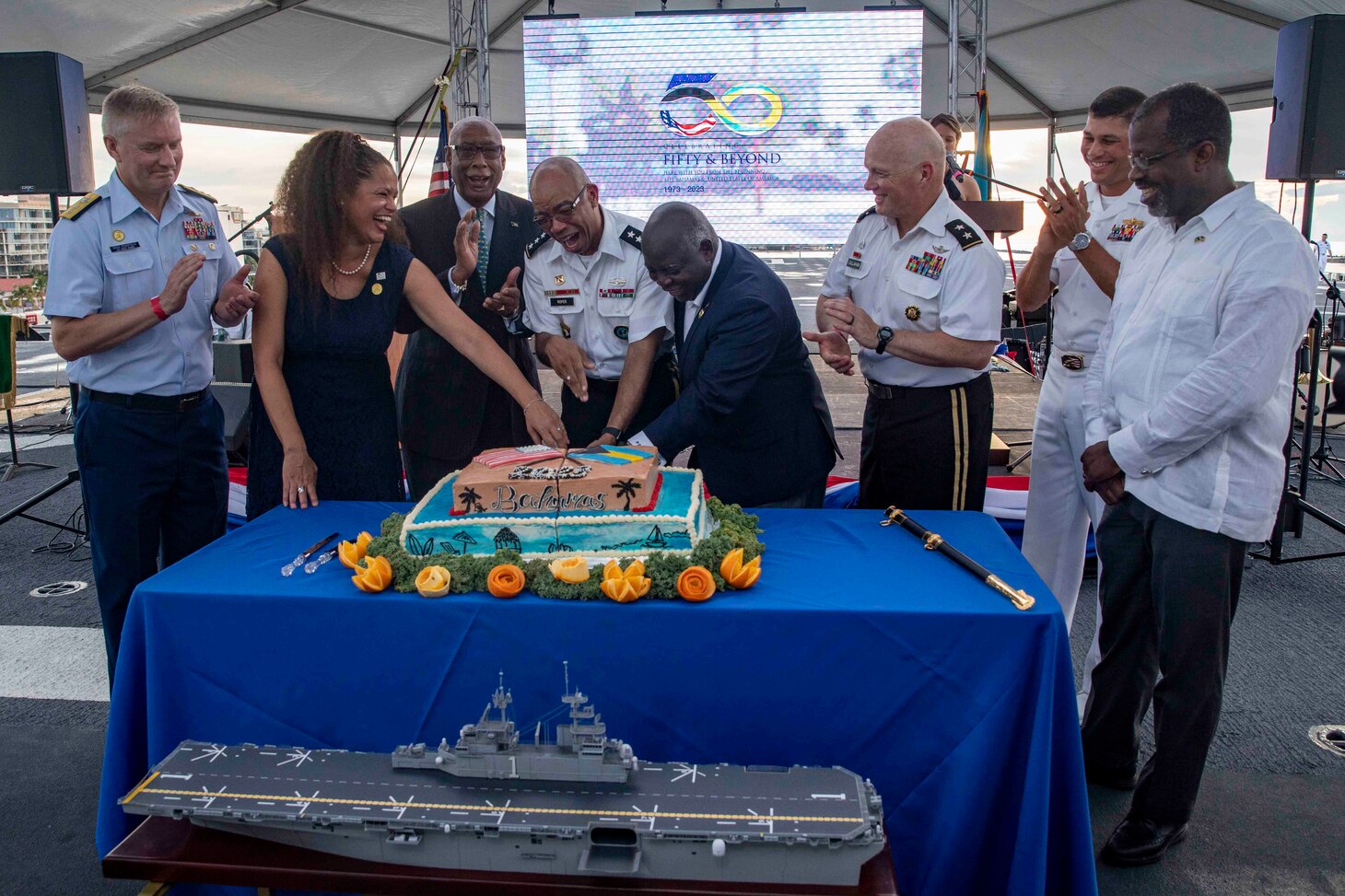 The Official party cuts the ceremonial cake