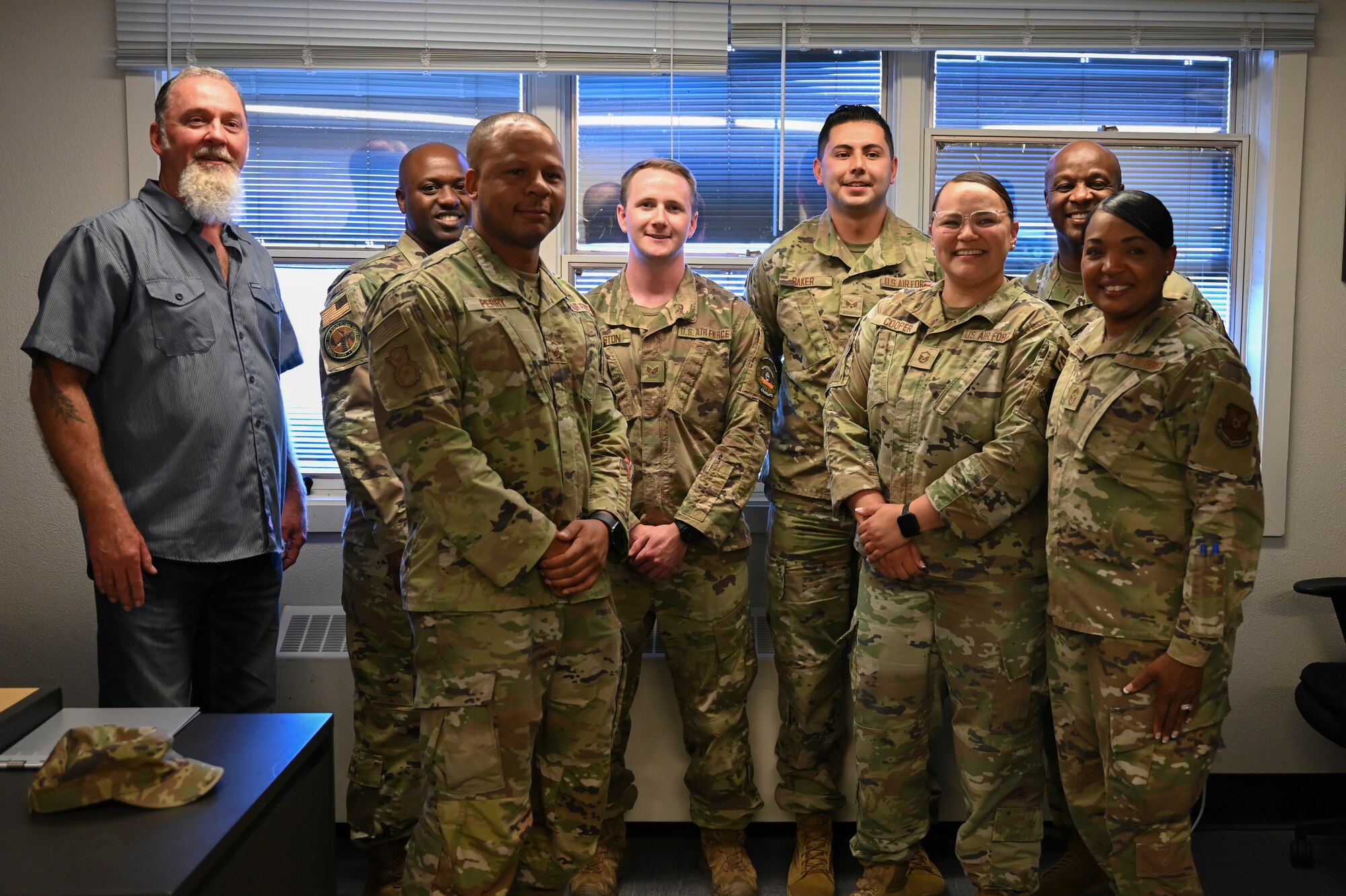 A group poses for a photo.