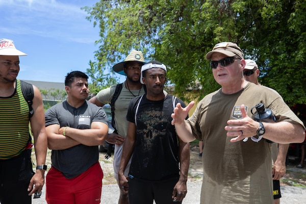 Man speaks with group