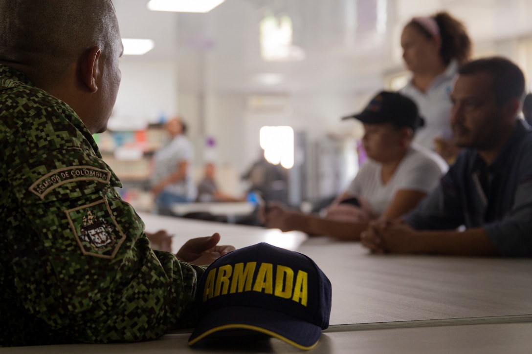 U.S. Marines with 4th Civil Affairs Group, Force Headquarters Group, in support of Special Purpose Marine Air-Ground Task Force UNITAS LXIV, meet with Rafael Ospina Toscano, mayor of Coveñas, along with other civilian leaders in Coveñas, Colombia, July 11, 2023. By meeting with local leaders, Marines forge bonds for the long-term advancement of regional security, maintaining favorable partnerships that deter aggression and supporting the stability that generates economic growth. UNITAS focuses on strengthening existing regional partnerships and encouraging the establishment of new relationships through the exchange of maritime mission-focused knowledge and expertise. (U.S. Marine Corps photo by LCpl. Samuel Qin)