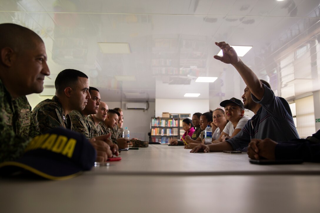 U.S. Marines with 4th Civil Affairs Group, Force Headquarters Group, in support of Special Purpose Marine Air-Ground Task Force UNITAS LXIV, meet with Rafael Ospina Toscano, mayor of Coveñas, along with other civilian leaders in Coveñas, Colombia, July 11, 2023. By meeting with local leaders, Marines forge bonds for the long-term advancement of regional security, maintaining favorable partnerships that deter aggression and supporting the stability that generates economic growth. UNITAS focuses on strengthening existing regional partnerships and encouraging the establishment of new relationships through the exchange of maritime mission-focused knowledge and expertise. (U.S. Marine Corps photo by LCpl. Samuel Qin)