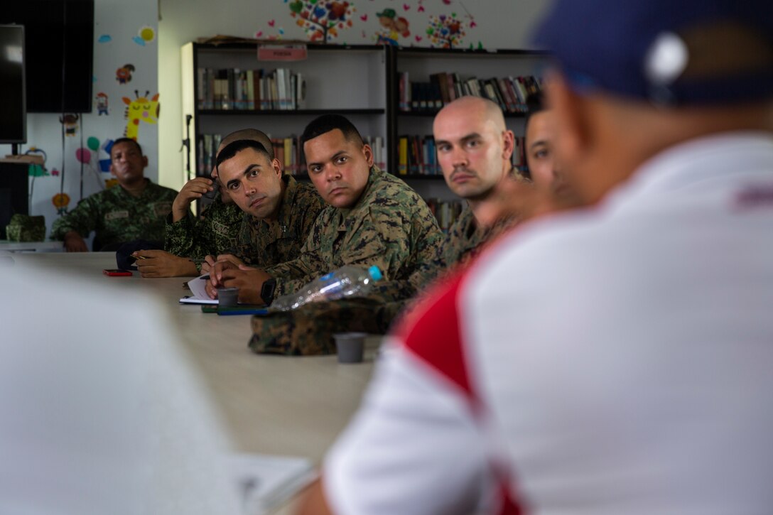 U.S. Marines with 4th Civil Affairs Group, Force Headquarters Group, in support of Special Purpose Marine Air-Ground Task Force UNITAS LXIV, meet with Rafael Ospina Toscano, mayor of Coveñas, along with other civilian leaders in Coveñas, Colombia, July 11, 2023. By meeting with local leaders, Marines forge bonds for the long-term advancement of regional security, maintaining favorable partnerships that deter aggression and supporting the stability that generates economic growth. UNITAS focuses on strengthening existing regional partnerships and encouraging the establishment of new relationships through the exchange of maritime mission-focused knowledge and expertise. (U.S. Marine Corps photo by LCpl. Samuel Qin)