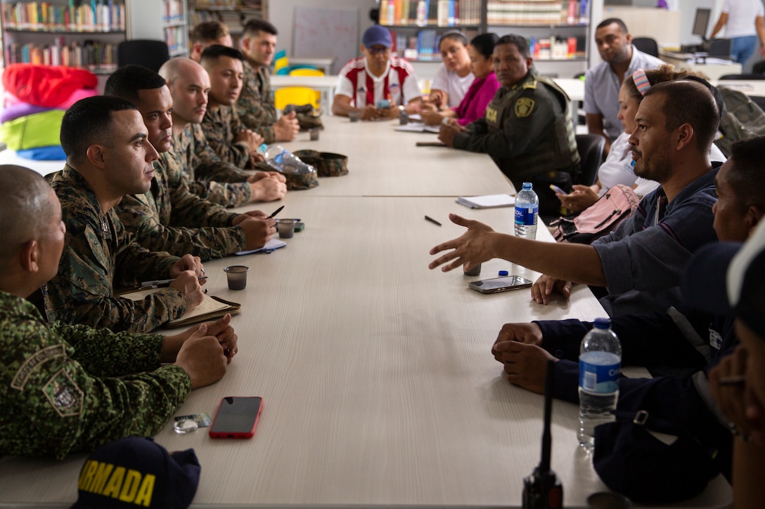 U.S. Marines with 4th Civil Affairs Group, Force Headquarters Group, in support of Special Purpose Marine Air-Ground Task Force UNITAS LXIV, meet with Rafael Ospina Toscano, mayor of Coveñas, along with other civilian leaders in Coveñas, Colombia, July 11, 2023. By meeting with local leaders, Marines forge bonds for the long-term advancement of regional security, maintaining favorable partnerships that deter aggression and supporting the stability that generates economic growth. UNITAS focuses on strengthening existing regional partnerships and encouraging the establishment of new relationships through the exchange of maritime mission-focused knowledge and expertise. (U.S. Marine Corps photo by LCpl. Samuel Qin)