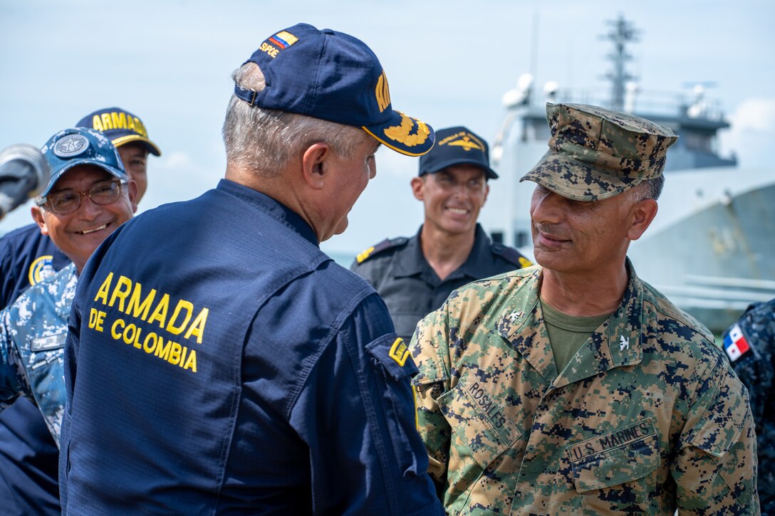 U.S. Marine Corps Colonel Guillermo Rosales, Special Purpose Marine Air-Ground Task Force UNITAS LXIV Commander, exchanges words with partner nation leaders during Multinational Operation Solidarex 2023 aboard Escuela de Formación de Infantería Marina Coveñas in Coveñas, Colombia, July 9, 2023. Twelve ships from eight countries participated in the humanitarian assistance exercise designed to train a multinational task force to respond to large-scale emergencies. This was the largest exercise of this kind in the Caribbean. (U.S. Marine Corps photo by Sgt. Juan Carpanzano)