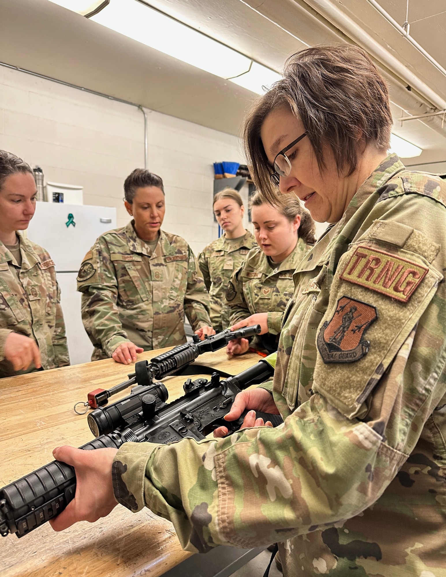 U.S. Air Force Airmen from the 133rd Force Support Squadron receive M-4 carbine rifle familiarization at Camp Ripley, Little Falls, Minn., May 6, 2023.