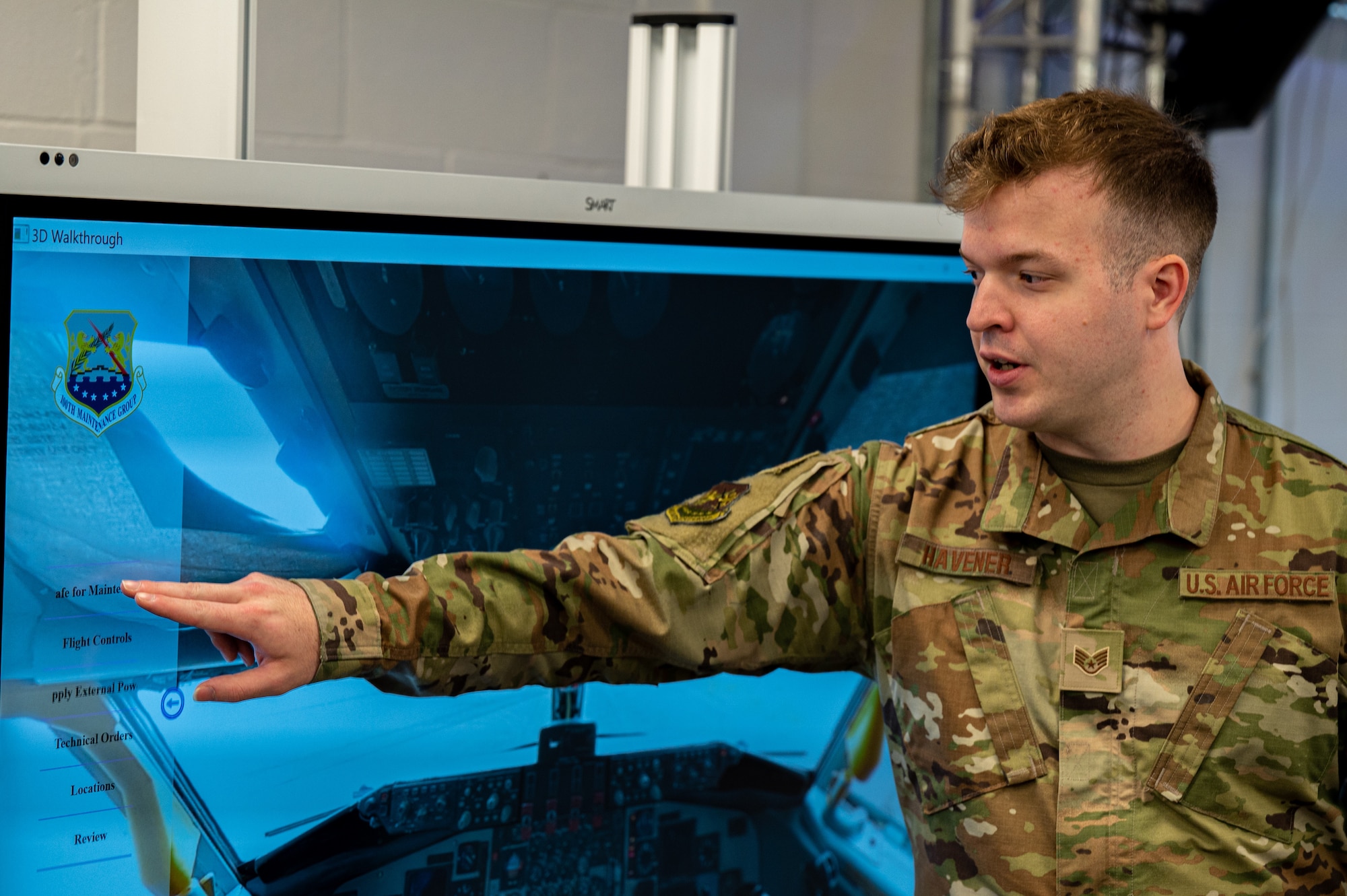 U.S. Air Force Staff Sgt. Jeremiah Havener, 100th Maintenance Group aircraft electrical and environmental systems craftsman and NCO in charge of virtual reality, uses his newly created KC-135 Stratotanker aircraft training tool at Royal Air Force Mildenhall, England, June 28, 2023.