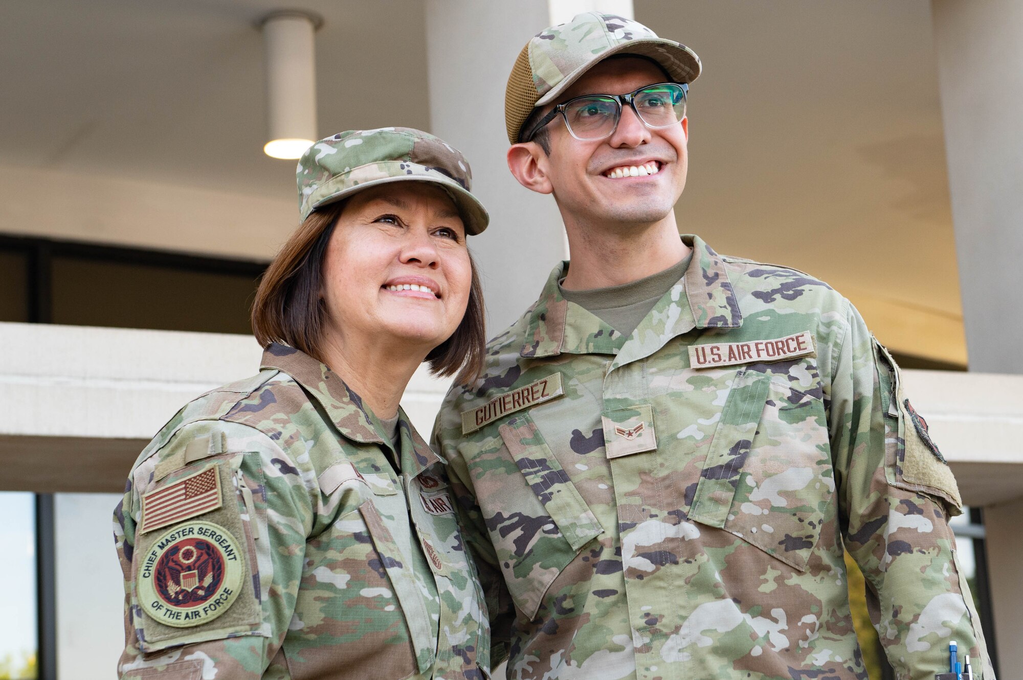 CMSAF taking picture with airman
