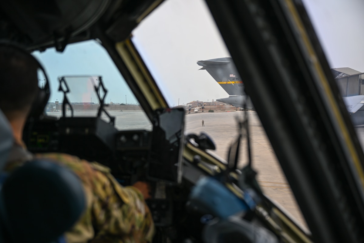 Photo looking out from inside C-17 cockpit.