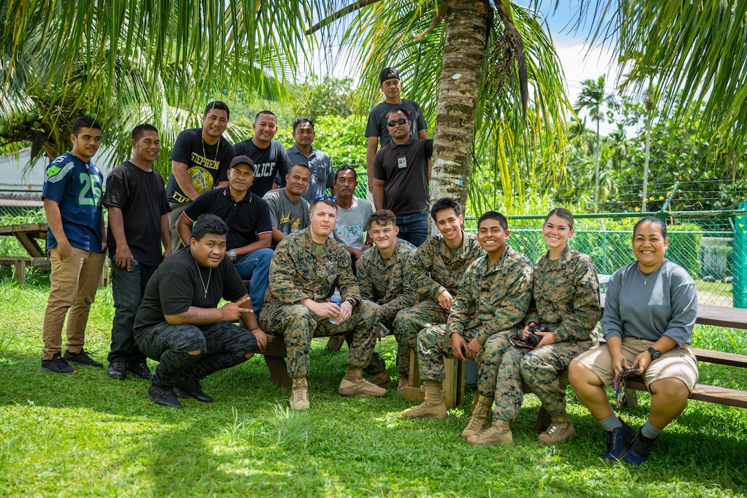 Cadets of the Chuuk State Police Academy pose for a photograph at the conclusion of a follow-on medical training class from U.S. Marines and a Sailor with Task Force Koa Moana 23 on Weno, Chuuk, Federated States of Micronesia, July 5, 2023. Marines and Sailors with Task Force Koa Moana assist Oceania regional allies and partners in their security and crisis response-force capabilities through increased training and exercises to build shared knowledge and best practices that will enhance future readiness within the Indo-Pacific region. (U.S. Marine Corps photo by Lance Cpl. Trent A. Henry)