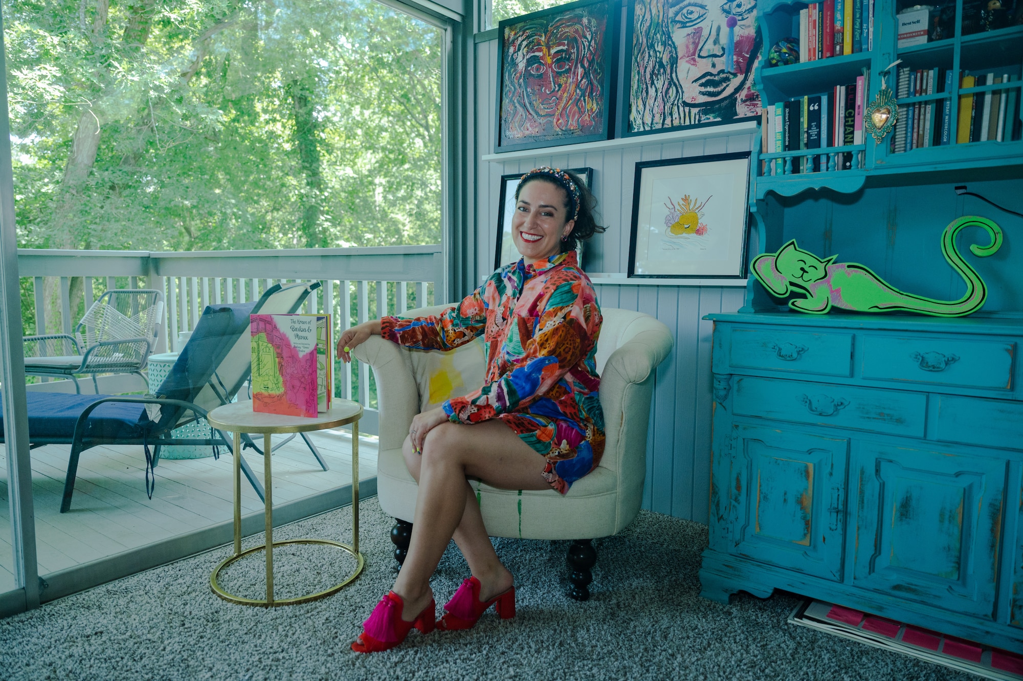 U.S. Air Force Maj. Lindsay Cordero, Air Force Global Strike Command Commander’s Action Group legislative liaison officer, poses for a photo in her studio, Shreveport, La., June 22, 2023. Cordero’s mission is to bring feelings of joy and belonging through her art and writing, which focuses on children’s literacy, conservation, and mental health. (U.S. Air Force photo by Airman 1st Class William Pugh)