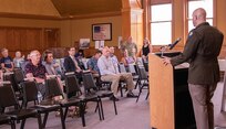 Lt. Col. Matthew Garrison, operations officer for the Illinois National Guard Joint Staff, talks about the shared history of the Illinois National Guard, the City of Wheaton, and DuPage County, during the First Shot at Gettysburg commemoration July 1 at the DuPage County Historical Museum.