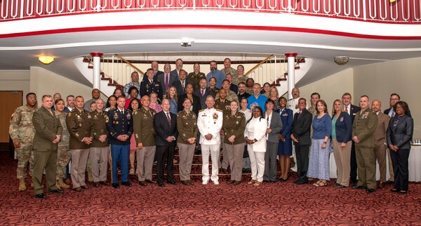 A group of Defense Logistics Agency Europe & Africa pose for a group photo.
