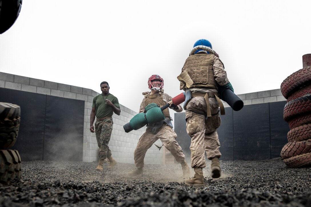 U.S. Marine Corps recruits with Mike Company, 3rd Recruit Training Battalion, conduct pugil sticks during the Crucible on Marine Corps Base Camp Pendleton, Calif., July 11, 2023. The Crucible is a 54-hour exercise where recruits apply the knowledge they have learned throughout recruit training, to earn the title of United States Marines. (U.S. Marine Corps photo by Sgt. Guyette)