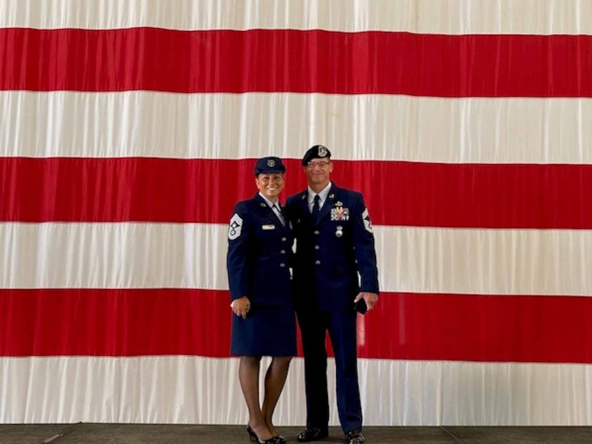 Chief Master Sgt. Sevin Balkuvvar and Chief Master Sgt. Lambert pose for photo.
