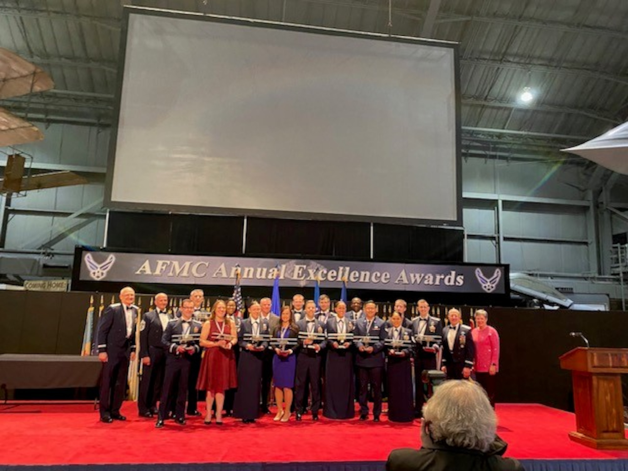 Chief Master Sgt. Sevin Balkuvvar poses with fellow award winners at the Air Force Material Command Annual Excellence Awards Ceremony.