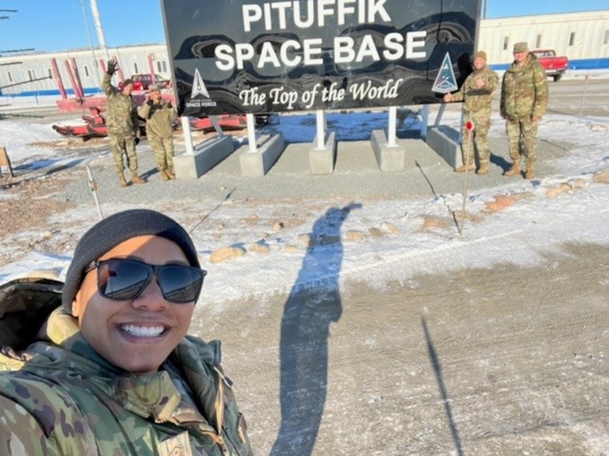Chief Master Sgt. Sevin Balkuvvar poses for photo with command teammates at Pituffik Space Base.