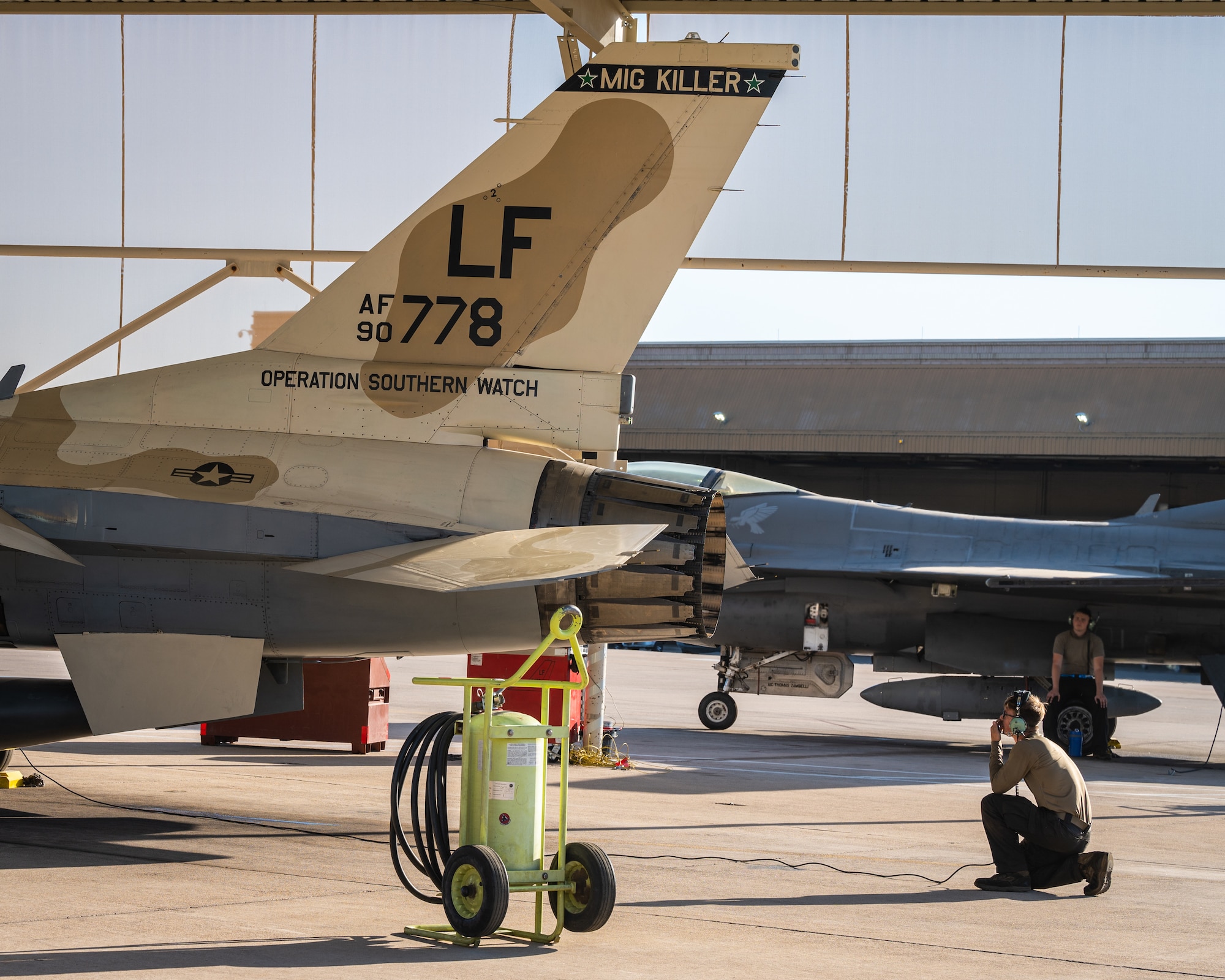 Airman 1st Class Keilani Durfey, 309th Fighter Squadron crew chief, conducts a routine pre-flight check on an F-16 Fighting Falcon before takeoff, July 10, 2023, at Luke Air Force Base, Arizona.