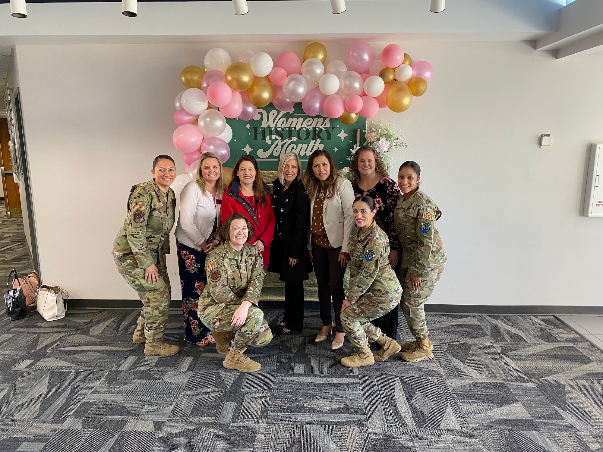 Chief Master Sgt. Sevin Balkuvvar celebrates Women's History Month with fellow teammates.