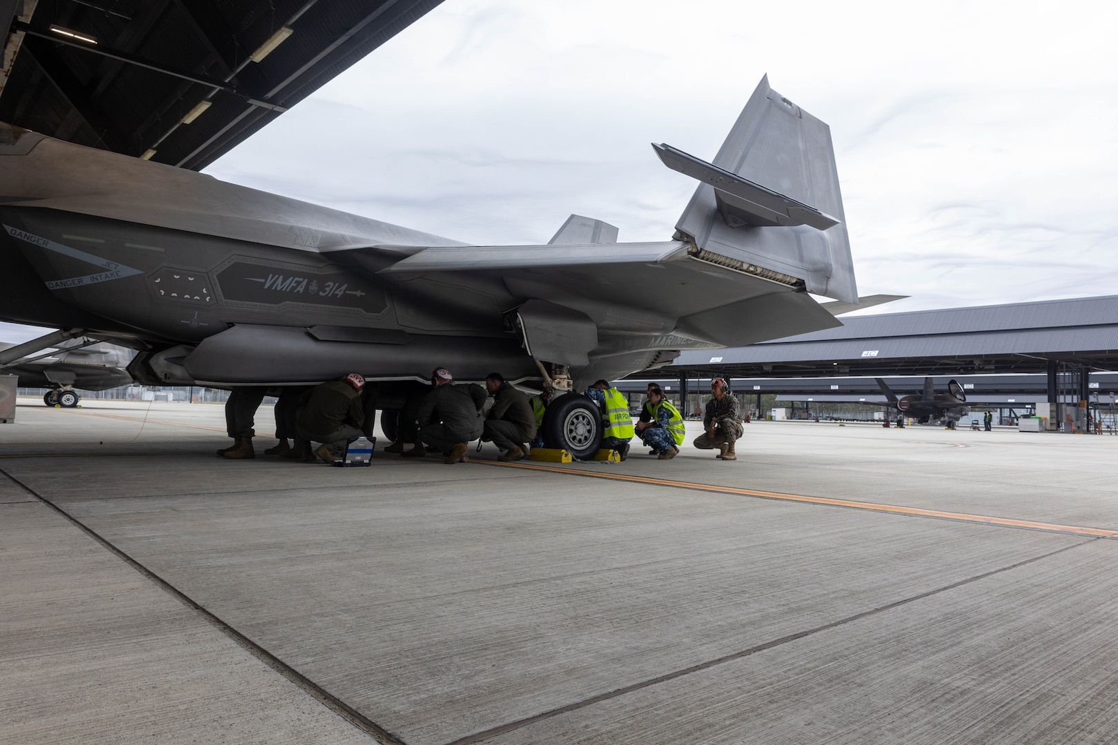 U.S. Marines with Marine Fighter Attack Squadron (VMFA) 314, Marine Aircraft Group 11, 3rd Marine Aircraft Wing, work together with Royal Australian Air Force (RAAF) aviators with RAAF No. 3 Squadron, at RAAF Base Williamtown, New South Wales, Australia, June-July, 2023. This is part of unit-level and bilateral training events designed to enhance U.S.-Australian relationships and further develop and sustain capabilities in the Indo-Pacific Region.