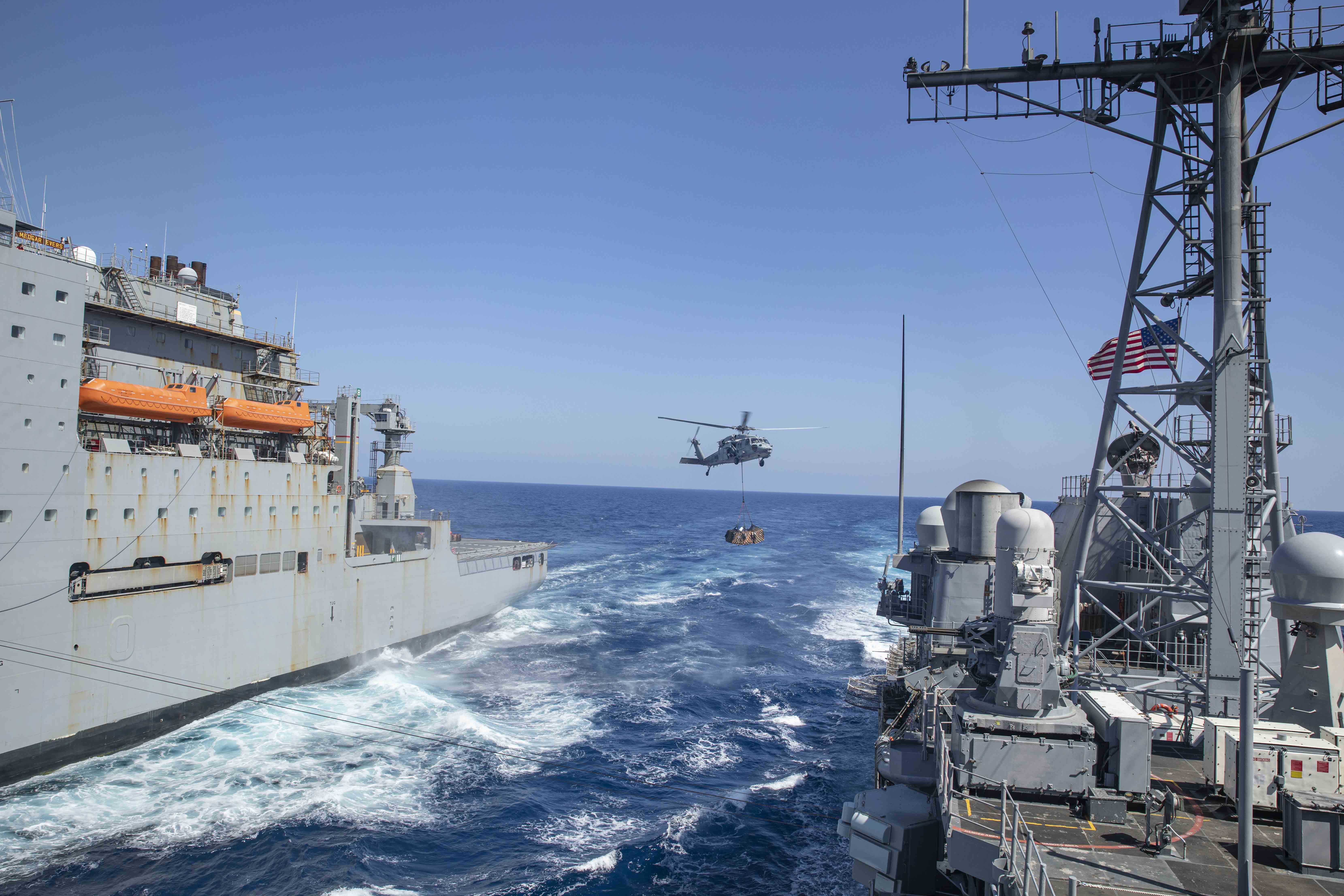 USS Normandy (CG 60) replenishes from USNS Medgar Evers (T-AKE 13).