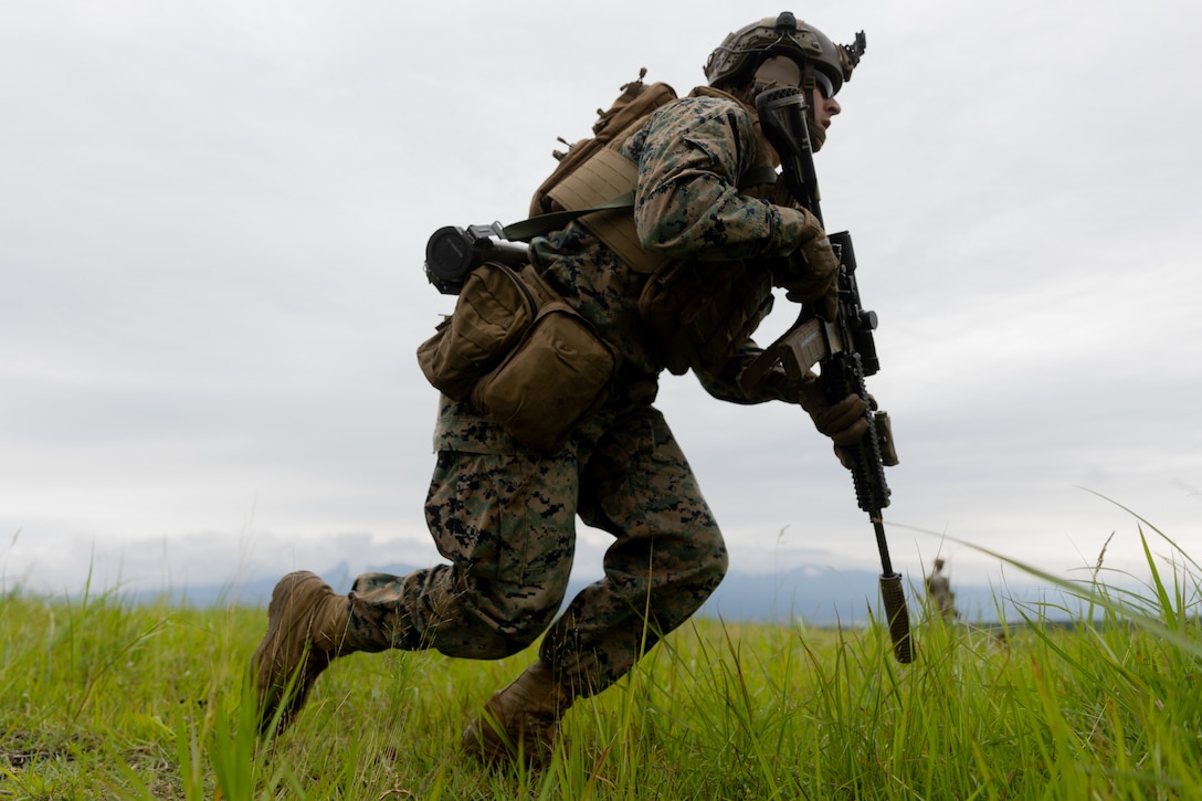 U.S. Marine Corps Lance Cpl. Noah Wilkins moves to a firing position during fireteam maneuver training at Combined Arms Training Center Camp Fuji, Japan, June 22, 2023. Fireteam training allows Marines to refine small-unit tactics and develop proficiency before executing combined arms-training. Wilkins, a native of Dayton, Ohio, is a team leader with 3d Battalion, 6th Marines and is currently forward-deployed with 4th Marines, 3d Marine Division in the Indo-Pacific under the Unit Deployment Program.