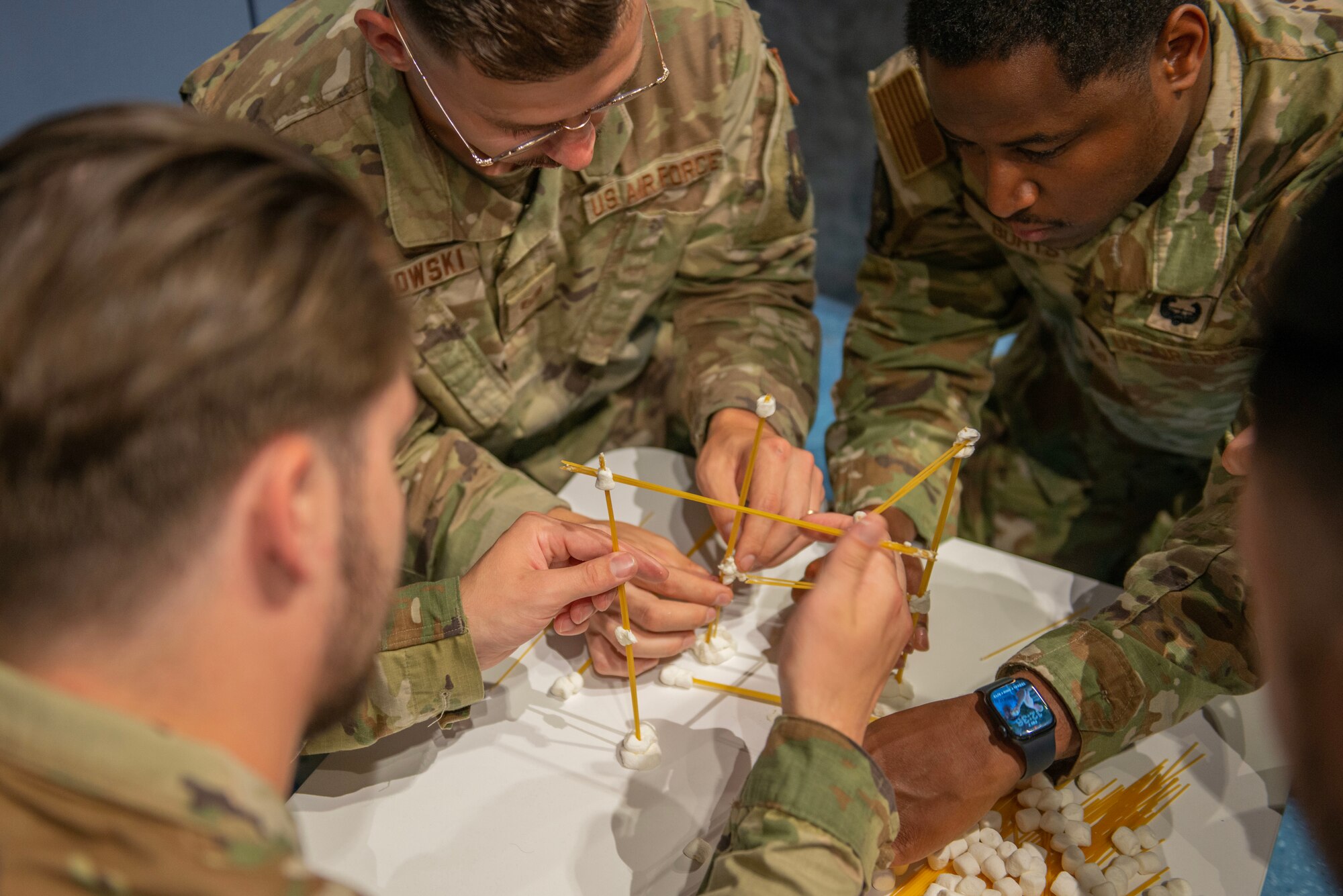 U.S. Air Force Airmen assigned to the 435th Air Ground Operations Wing participate in a team-building activity together during a noncommissioned officer professional development seminar at Ramstein Air Base, Germany, July 7, 2023. The seminar’s attendees built various leadership skills such as military decision making, critical thinking, team building, setting standards and using lawful orders to improve as NCOs in their work centers. (U.S. Air Force photo by Senior Airman Madelyn Keech)