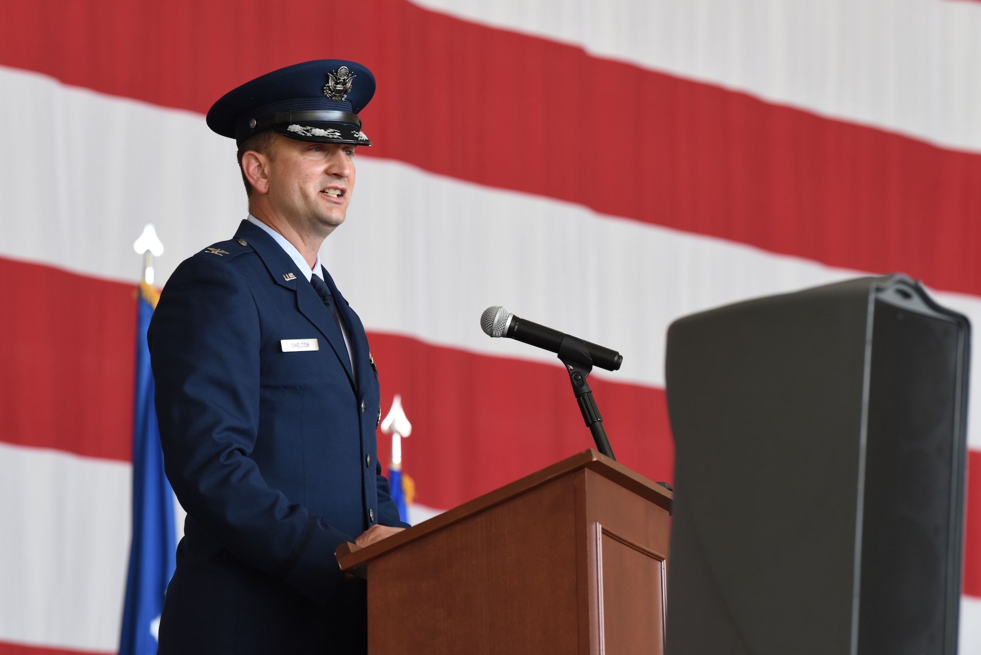 Man speaking at a podium