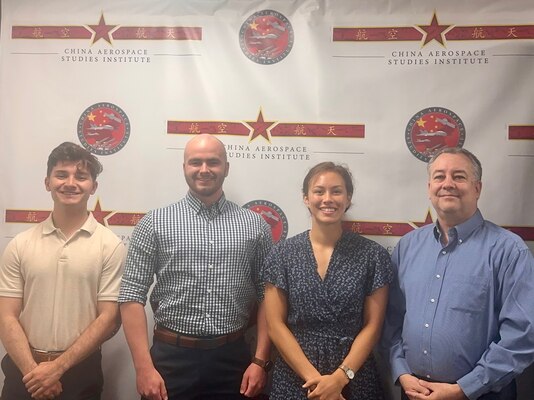 U.S. Air Force Academy Andre Birkner, Zach Bollinger and Katrina Benson interned for Dr. Brendan Mulvaney (right) at China Aerospace Studies Institute at National Defense University facility in Washington, D.C., during their summer research program June and July 2023. This is the fourth year CASI has hosted cadets as part of the academy’s summer program, enabling mostly rising seniors to take part in research related to activity in the Pacific. Mulvaney is the CASI director. Cadet Payton Rawson also interned but was unavailable for the photo. (Courtesy photo)