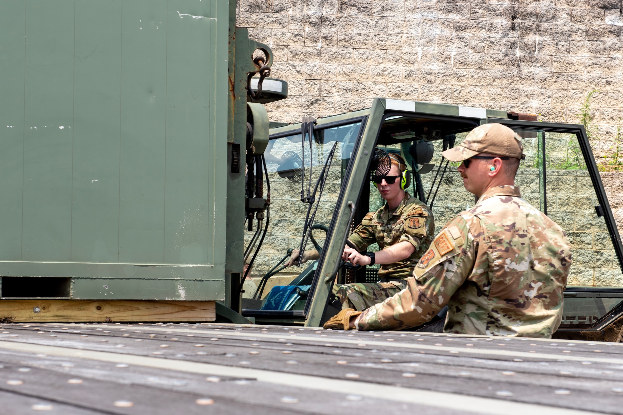 North Carolina Air National Guard assists with aircraft lift due to Delta Airlines flight 1092 making an emergency landing on the Charlotte-Douglas International Airport’s runway June28.