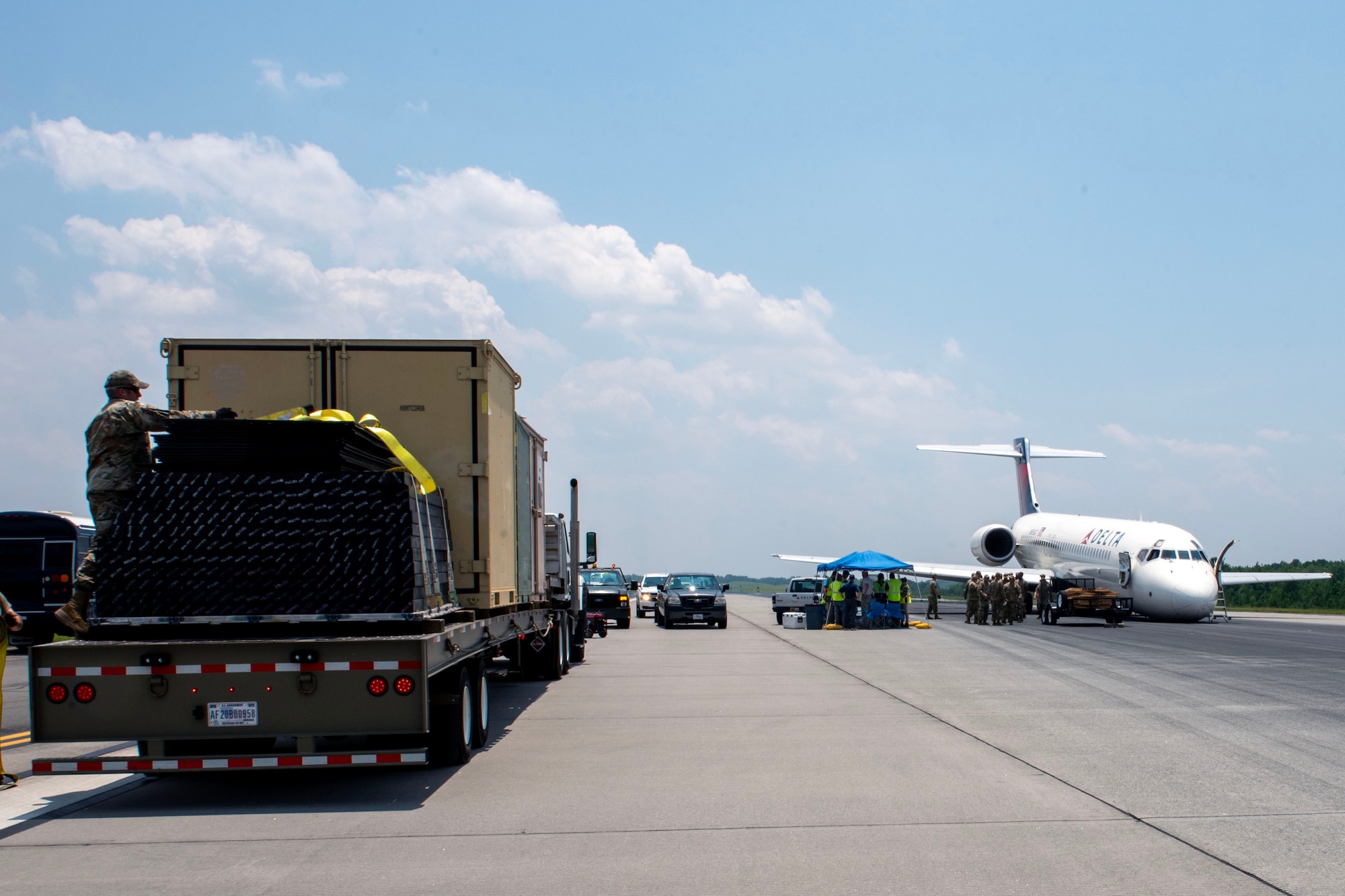 North Carolina Air National Guard assists with aircraft lift due to Delta Airlines flight 1092 making an emergency landing on the Charlotte-Douglas International Airport’s runway June28.