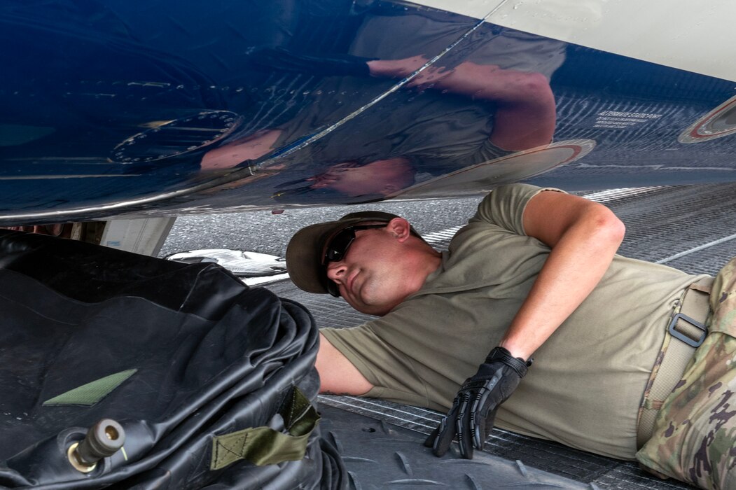 North Carolina Air National Guard assists with aircraft lift due to Delta Airlines flight 1092 making an emergency landing on the Charlotte-Douglas International Airport’s runway June28.
