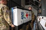 U.S. and Peruvian Airmen assigned to the Combined Joint Task Force, Resolute Sentinel 23, help load medical supplies at Base Aérea Las Palmas to be used by personnel at Hospital Dos De Mayo, Lima, Peru, July 5, 2023, during exercise Resolute Sentinel 23. On July 11, Defense Logistics Agency Troop Support Medical Transportation Team marked 2500 freight shipments using a new system that delivers bulk orders of critical supplies in record time. (U.S. Air Force photo by Master Sgt. Corban Lundborg)