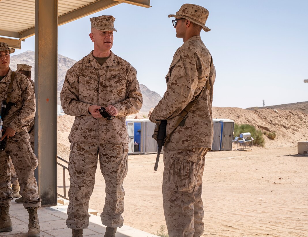 U.S. Marine Corps Pfc. Nadi Chams meets with Maj. Gen. Paul J. Rock Jr., commander, U.S. Marine Corps Forces, Central Command, during Intrepid Maven 23.4, July 5, 2023. Intrepid Maven is a bilateral exercise between U.S. Marine Corps Forces, Central Command and Jordanian Armed Forces designed to improve interoperability, strengthen partner-nation relationships in the U.S. Central Command area of responsibility, and improve both individual and bilateral unit readiness. Chams is a native of Jacksonville, FL. (U.S. Marine Corps photo by Cpl. Jonah White)
